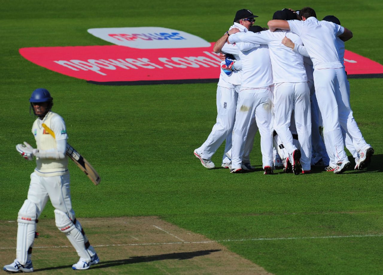 England celebrate a remarkable win as Suranga Lakmal trudges off, England v Sri Lanka, 1st Test, Cardiff, 5th day, May 30, 2011