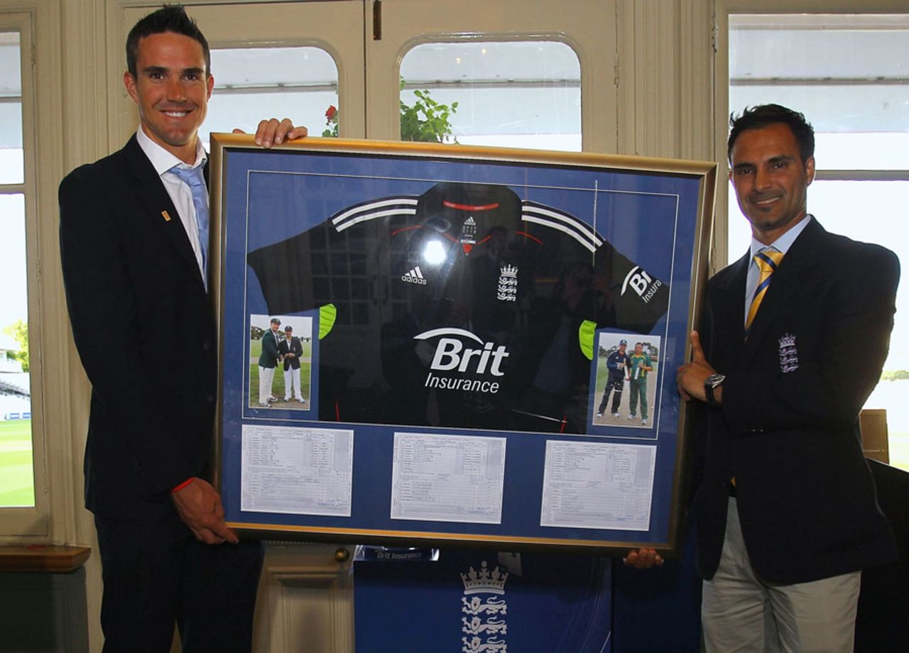 Kevin Pietersen presents ECB disabled cricketer of the year Umesh Valjee with a framed England shirt, Lord's, London, May 31, 2011