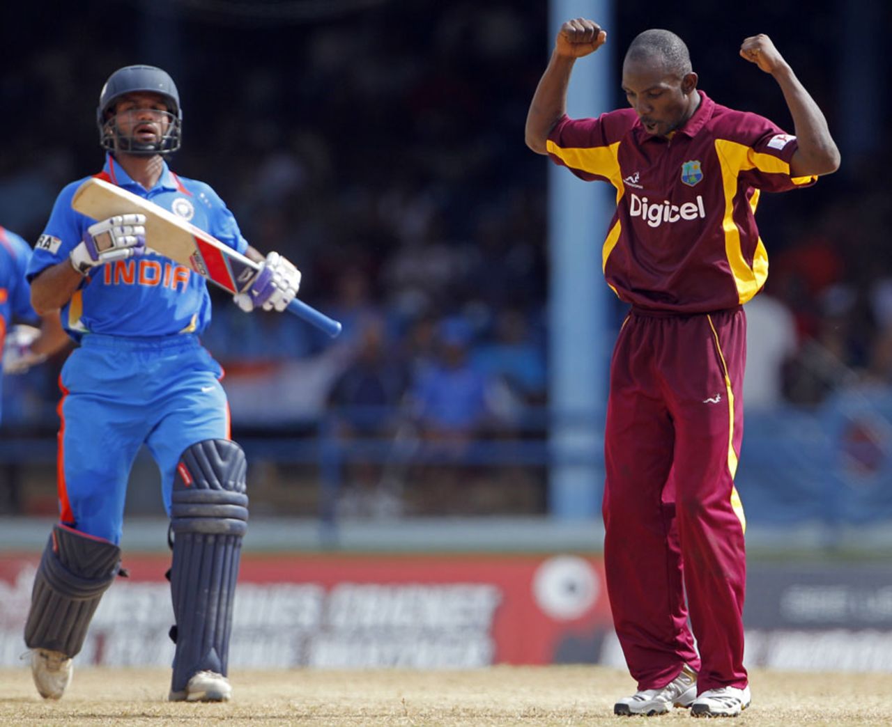 Anthony Martin is thrilled to see the back of Shikhar Dhawan, 1st ODI, Trinidad, June 6, 2011