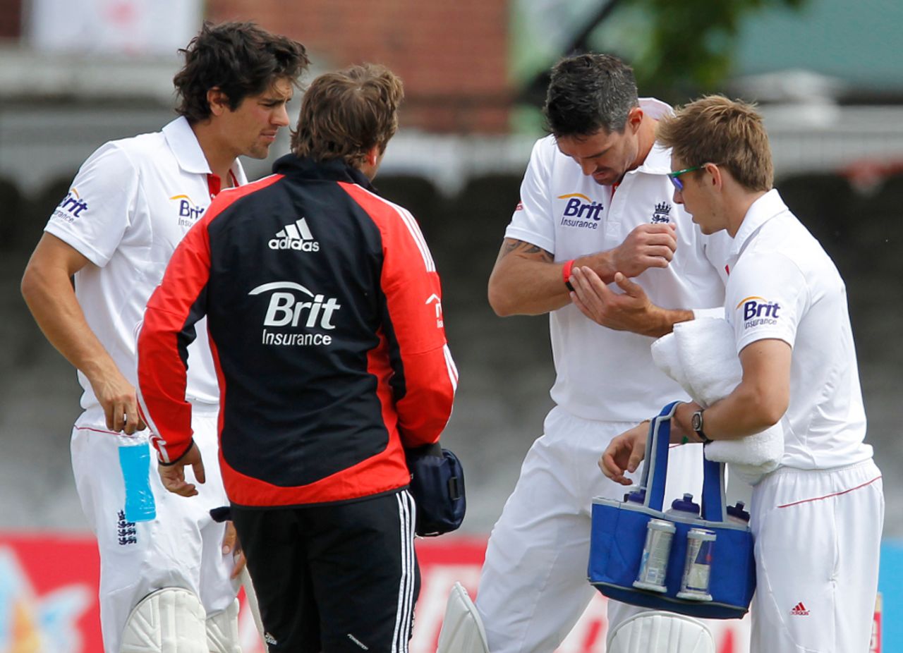 Kevin Pietersen receives some treatment on his wrist after being struck by the ball, England v Sri Lanka, 2nd Test, Lord's, 5th day, June 7, 2011