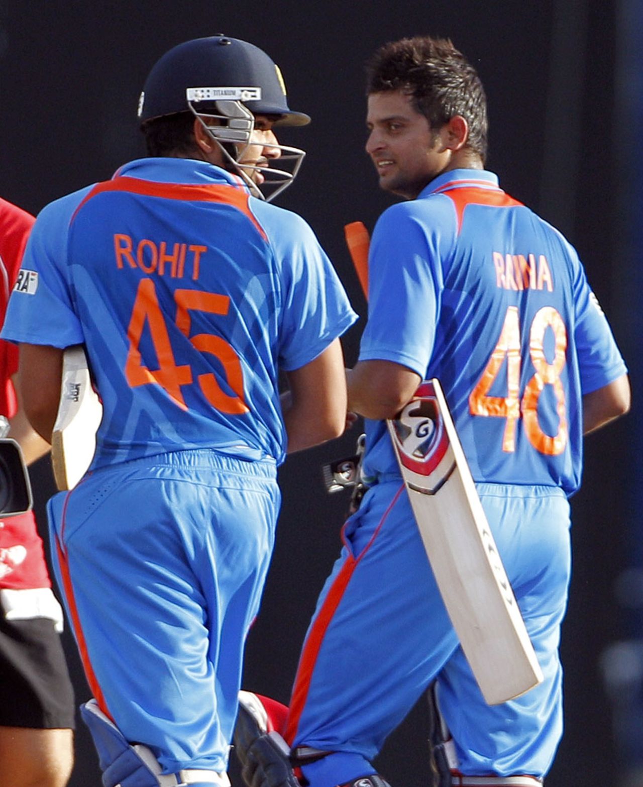 Rohit Sharma and Suresh Raina head to the pavilion, West Indies v India, 2nd ODI, Trinidad, June 8, 2011