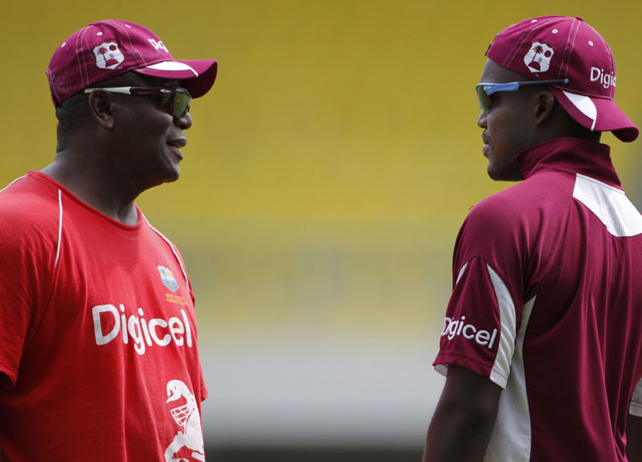Desmond Haynes and Darren Bravo have a chat during training, West Indies v India, Antigua, June 10, 2011