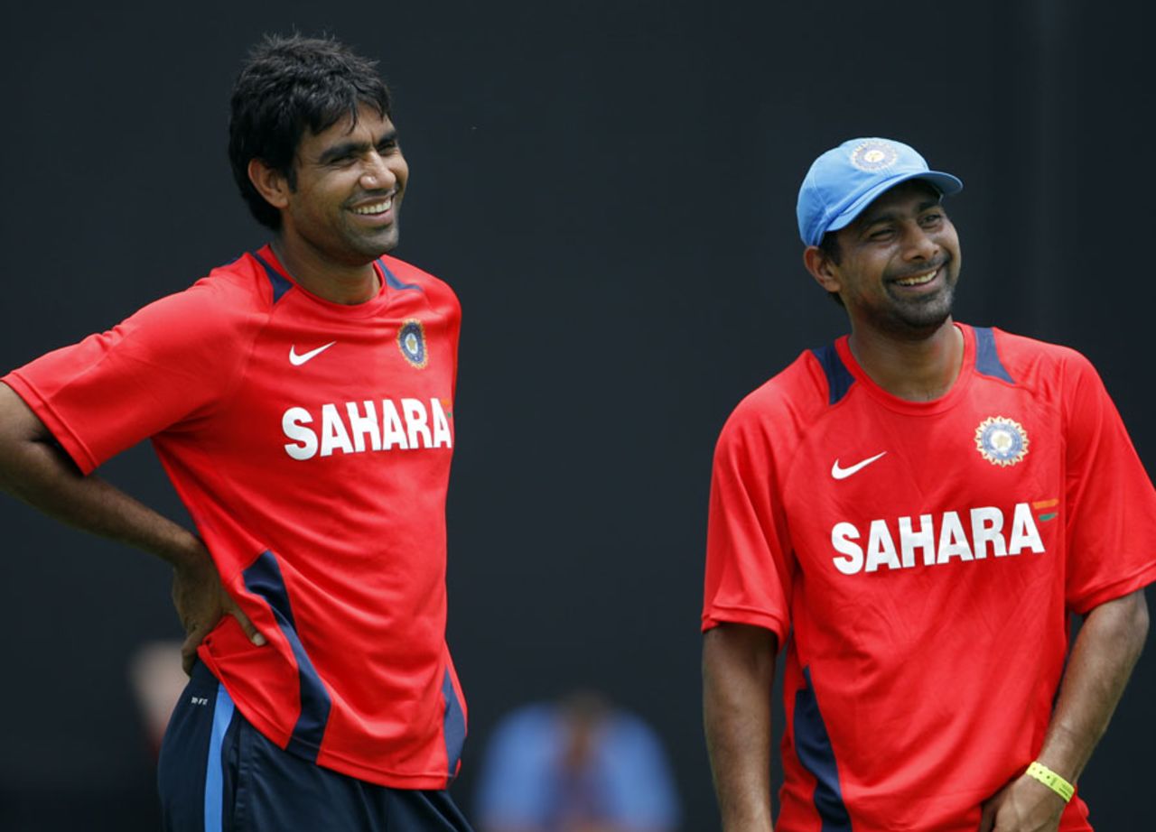 New-ball partners Munaf Patel and Praveen Kumar share a smile, West Indies v India, Antigua, June 10, 2011