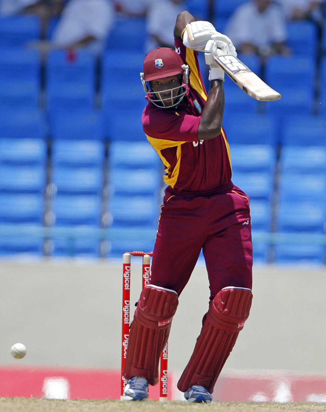 Andre Russell drives on the off side, West Indies v India, 3rd ODI, Antigua, June 11, 2011
