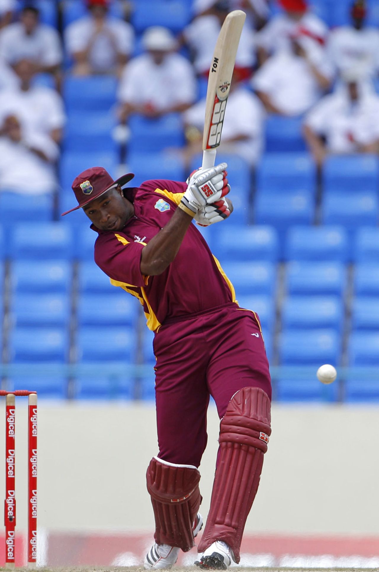 Kieron Pollard smashes one down the ground, West Indies v India, 4th ODI, Antigua, June 13, 2011