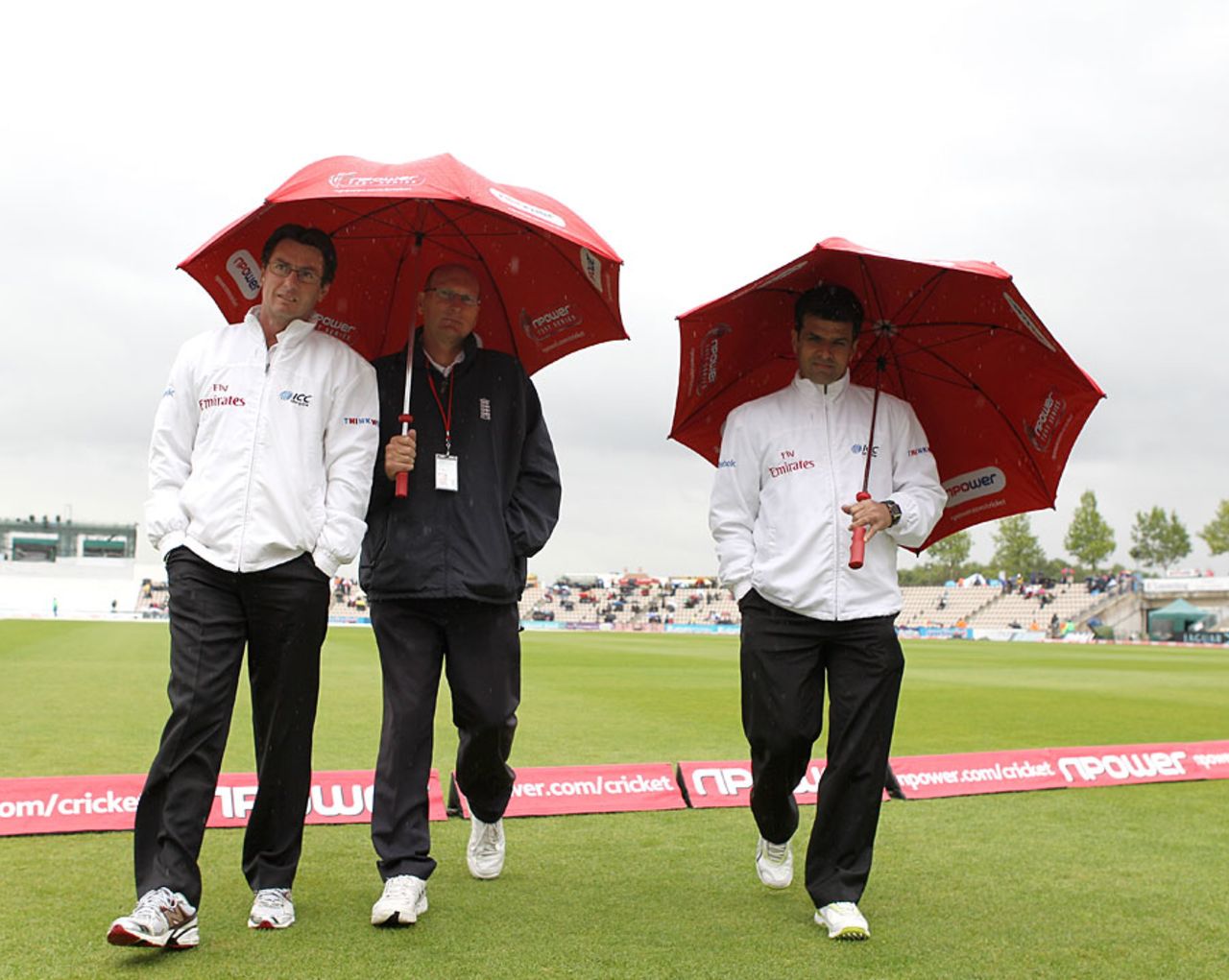 The umpires spent plenty of time under umbrellas, England v Sri Lanka, 3rd Test, Rose Bowl, June 17, 2011