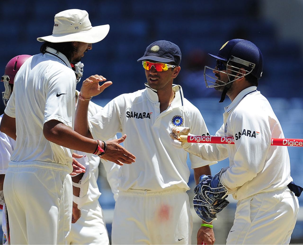 Ishant Sharma, Rahul Dravid and MS Dhoni celebrate India's win, West Indies v India, 1st Test, Kingston, 4th day, June 23, 2011