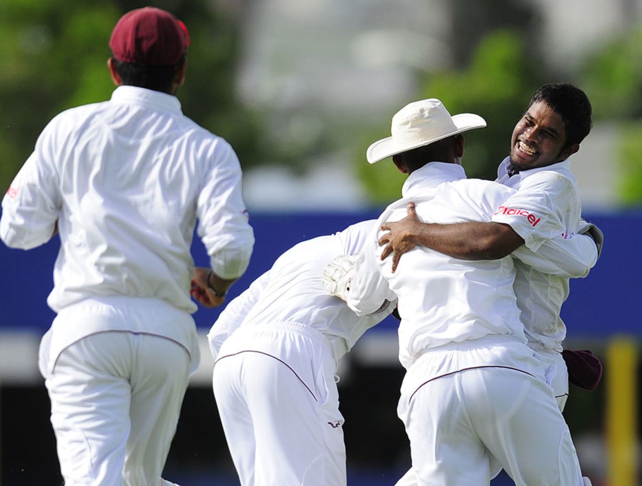 Adrian Barath is congratulated on catching Harbhajan Singh, West Indies v India, 2nd Test, Bridgetown, 1st day, June 28, 2011 