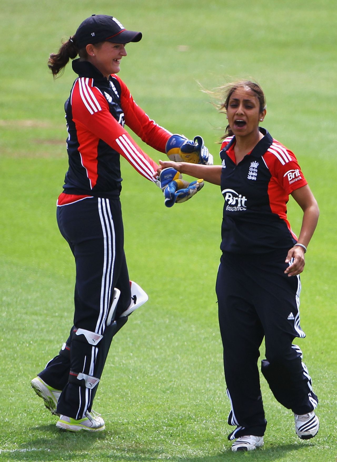 Isa Guha and Sarah Taylor celebrate an early wicket against India, England v India, NatWest Women's Quadrangular Series, Derby, June 30 2011