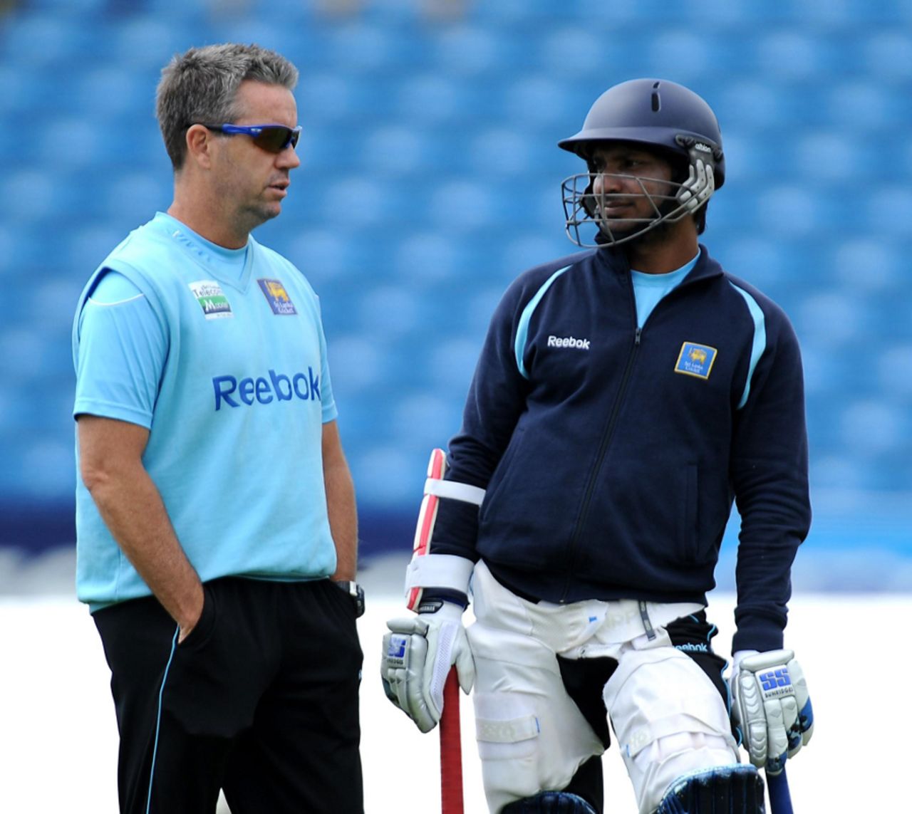 Coach Stuart Law chats to Kumar Sangakkara during Sri Lanka's net session, Headingley, June 30 2011