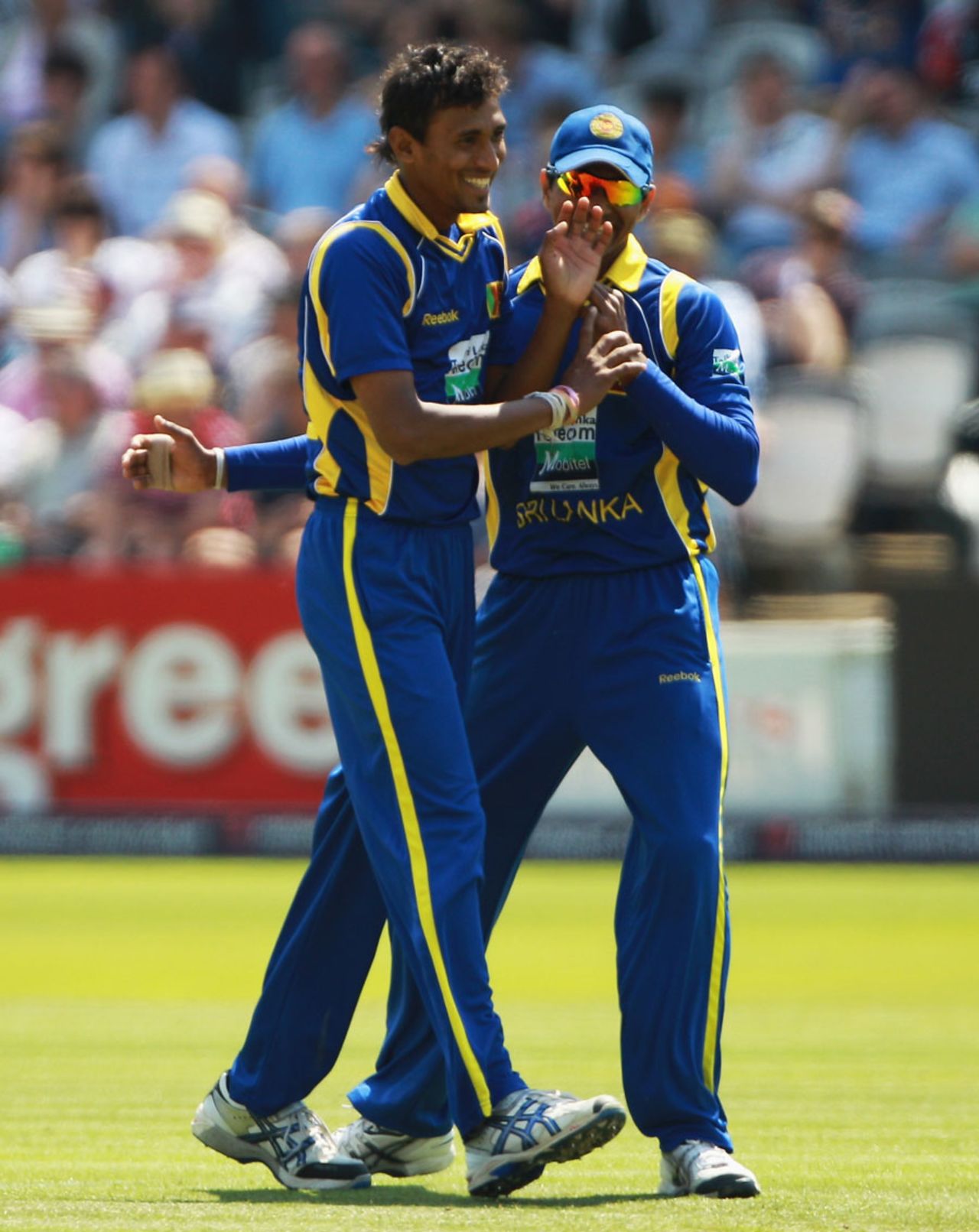 Suranga Lakmal celebrates with Suraj Randiv after removing Jonathan Trott, England v Sri Lanka, 3rd ODI, Lord's July 3 2011