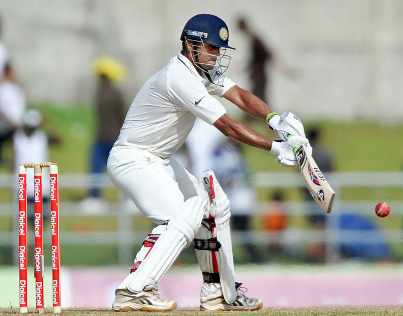 Rahul Dravid is all concentration as he plays the ball to the off side, West Indies v India, 3rd Test, Dominica, 5th day, July 10, 2011