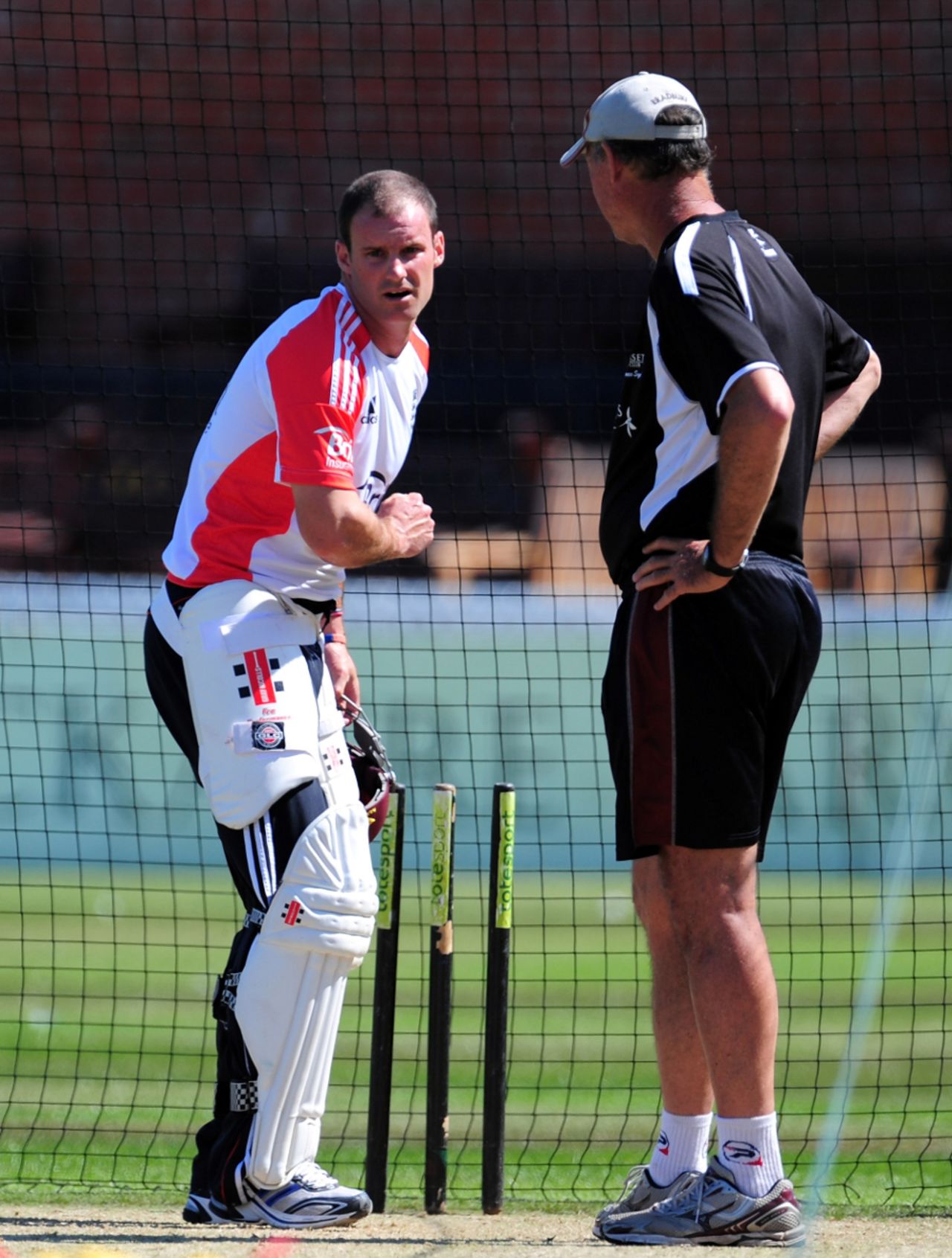 Andrew Strauss does some work in the nets with former South Africa opener Jimmy Cook, Taunton, July 14 2011