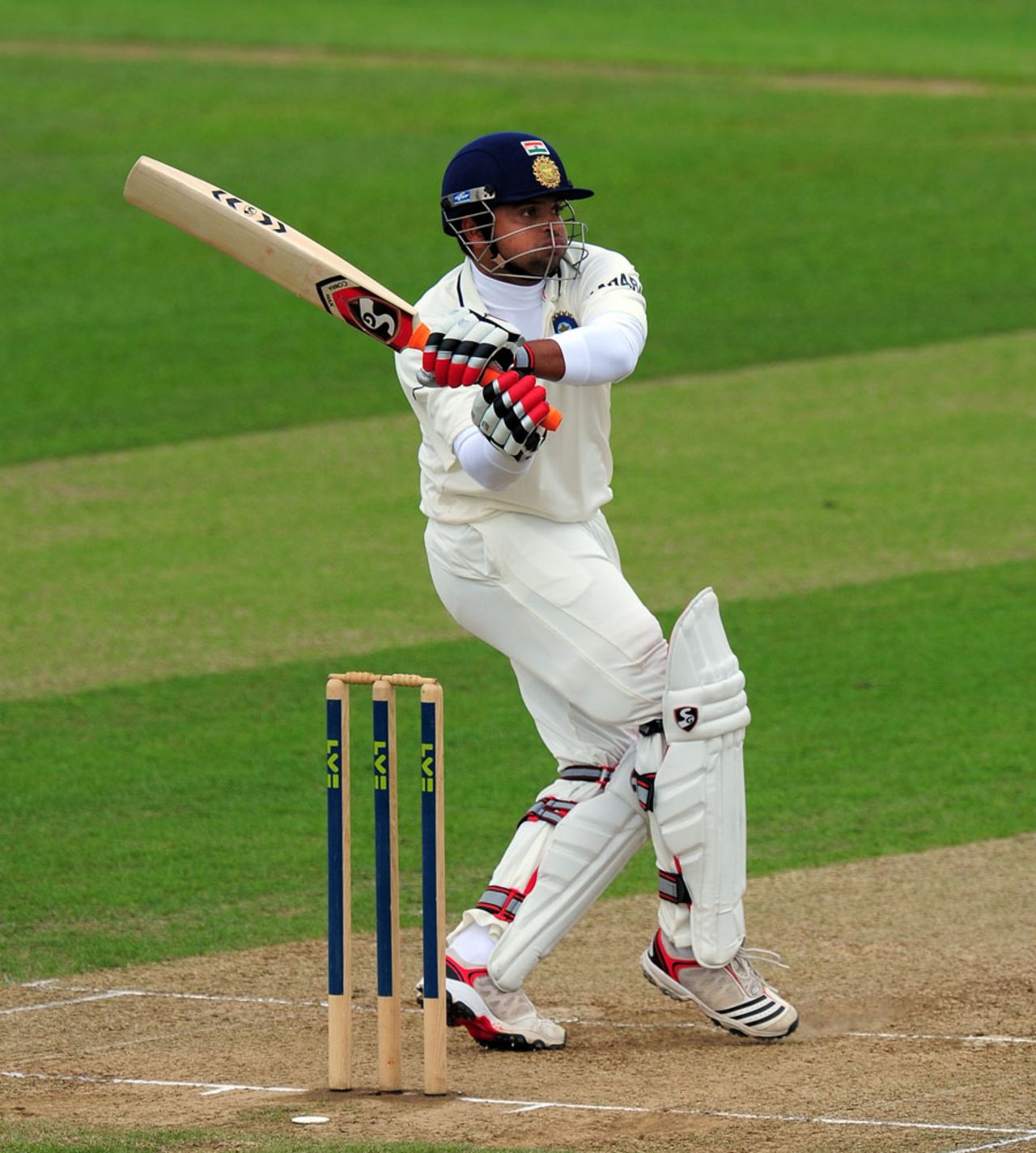 Suresh Raina watches the ball after playing a pull shot, Somerset v Indians, Taunton, 3rd day, July 17, 2011