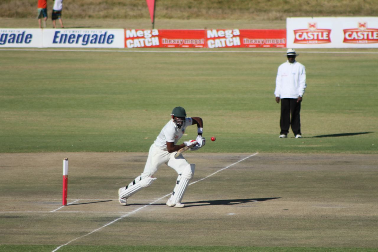 Hamilton Masakadza drives through the covers, Zimbabwe XI v Australia, Harare, 3rd day, July 17, 2011