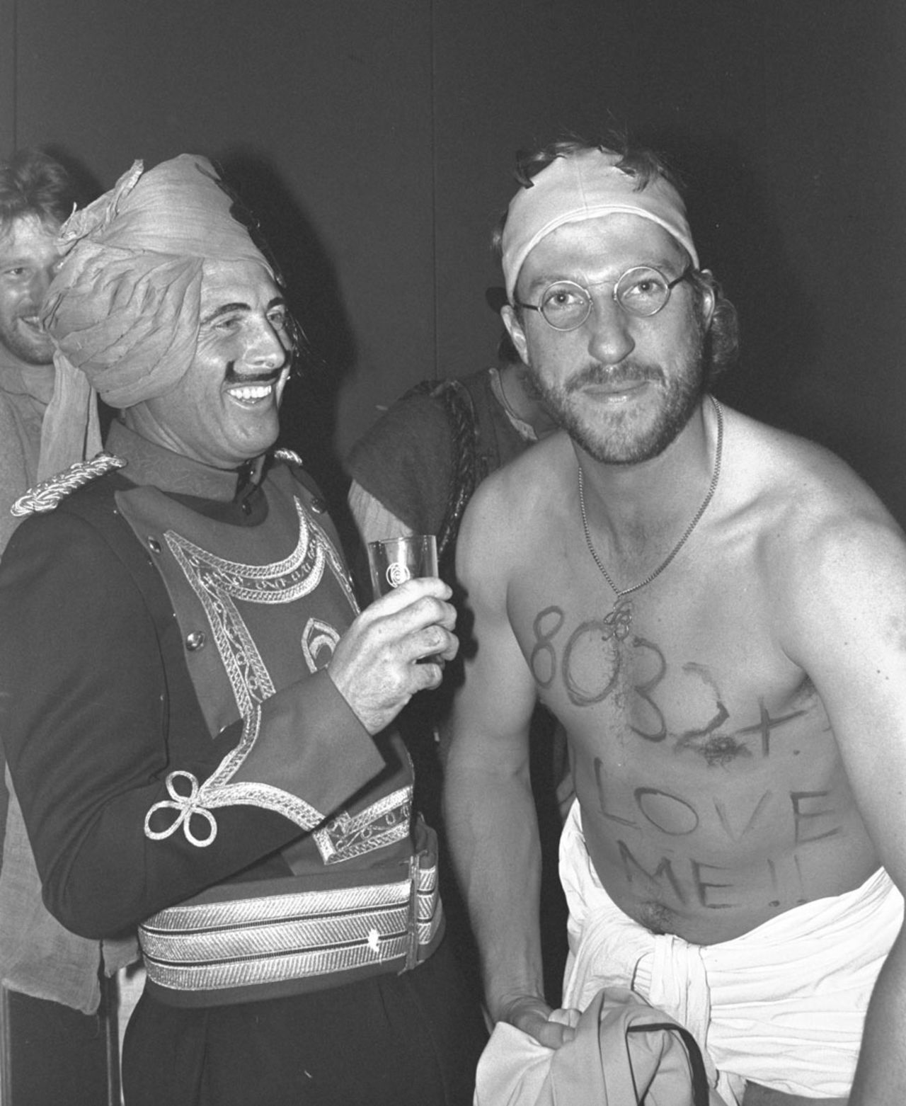 Ian Botham ribs Geoff Boycott at a party after Boycott became the highest run-getter in Tests, Delhi, 1981