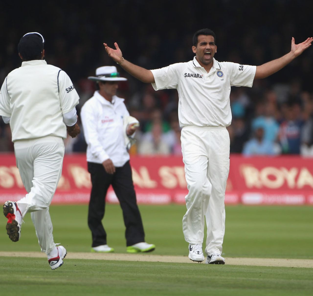 Zaheer Khan is pumped up after getting Andrew Strauss to hole out, England v India, 1st Test, Lord's, 1st day, July 21, 2011