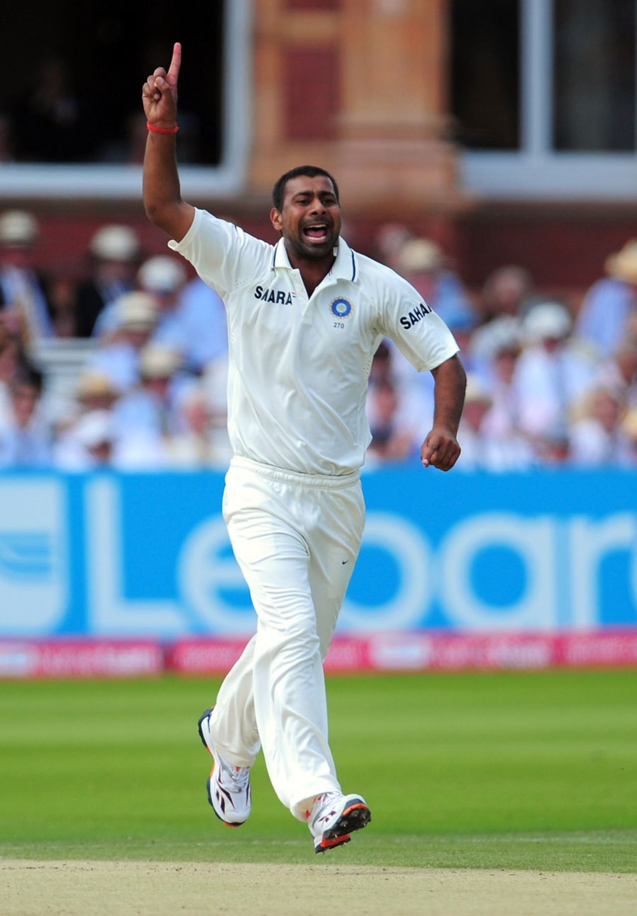 Praveen Kumar celebrates dismissing Alastair Cook, England v India, 1st Test, Lord's, 4th day, July 24, 2011