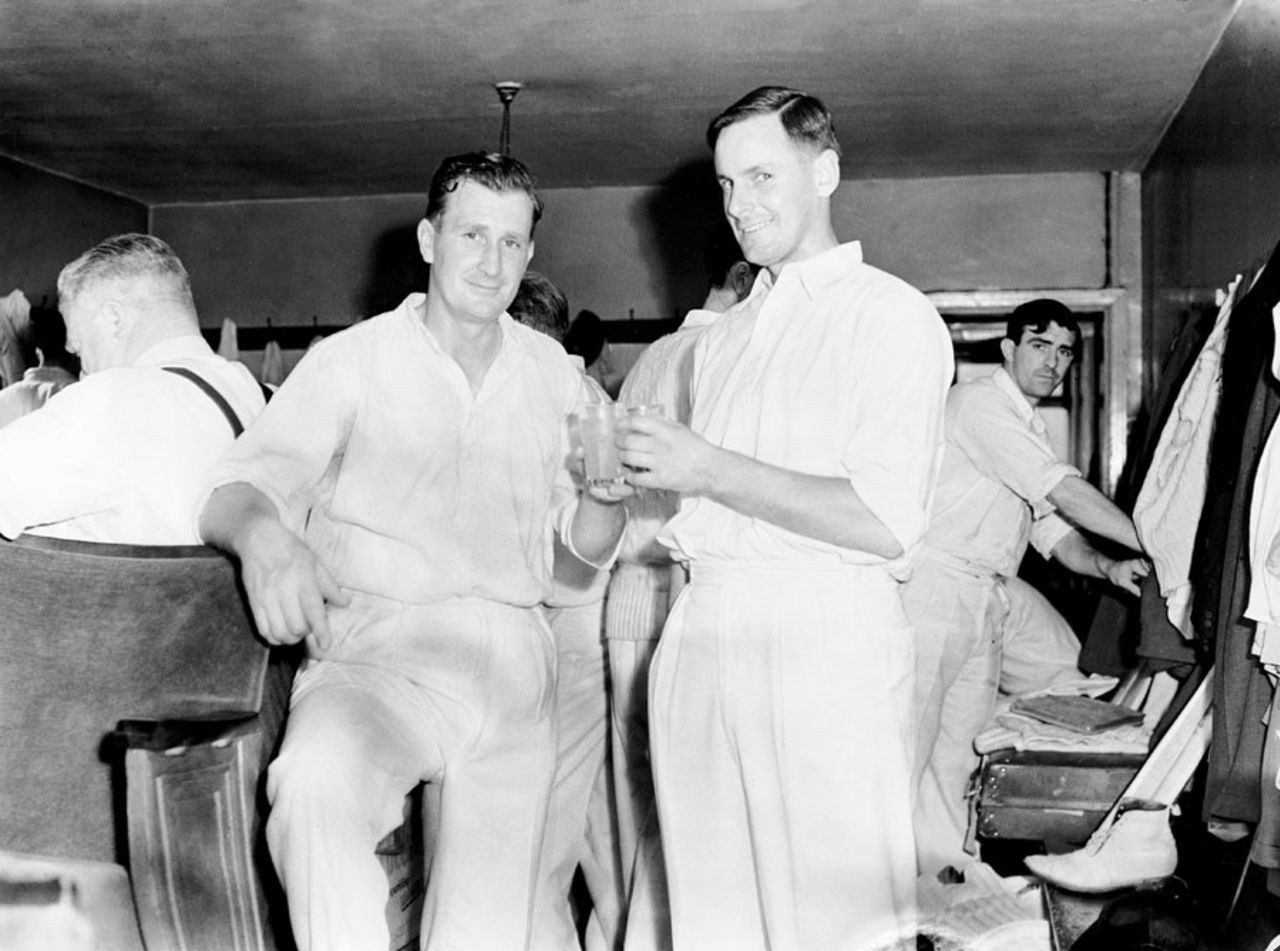 Jim Laker celebrates his first-innings nine-wicket haul with Peter May, England v Australia, 4th Test, Old Trafford, 2nd day, July 27, 1956