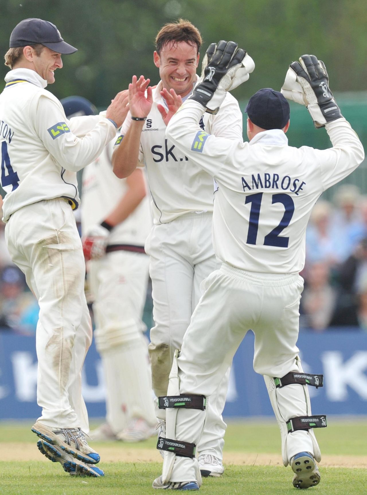 Neil Carter is congratulated on another Lancashire wicket, Lancashire v Warwickshire, County Championship Divison One, Aigburth, August 1 2011