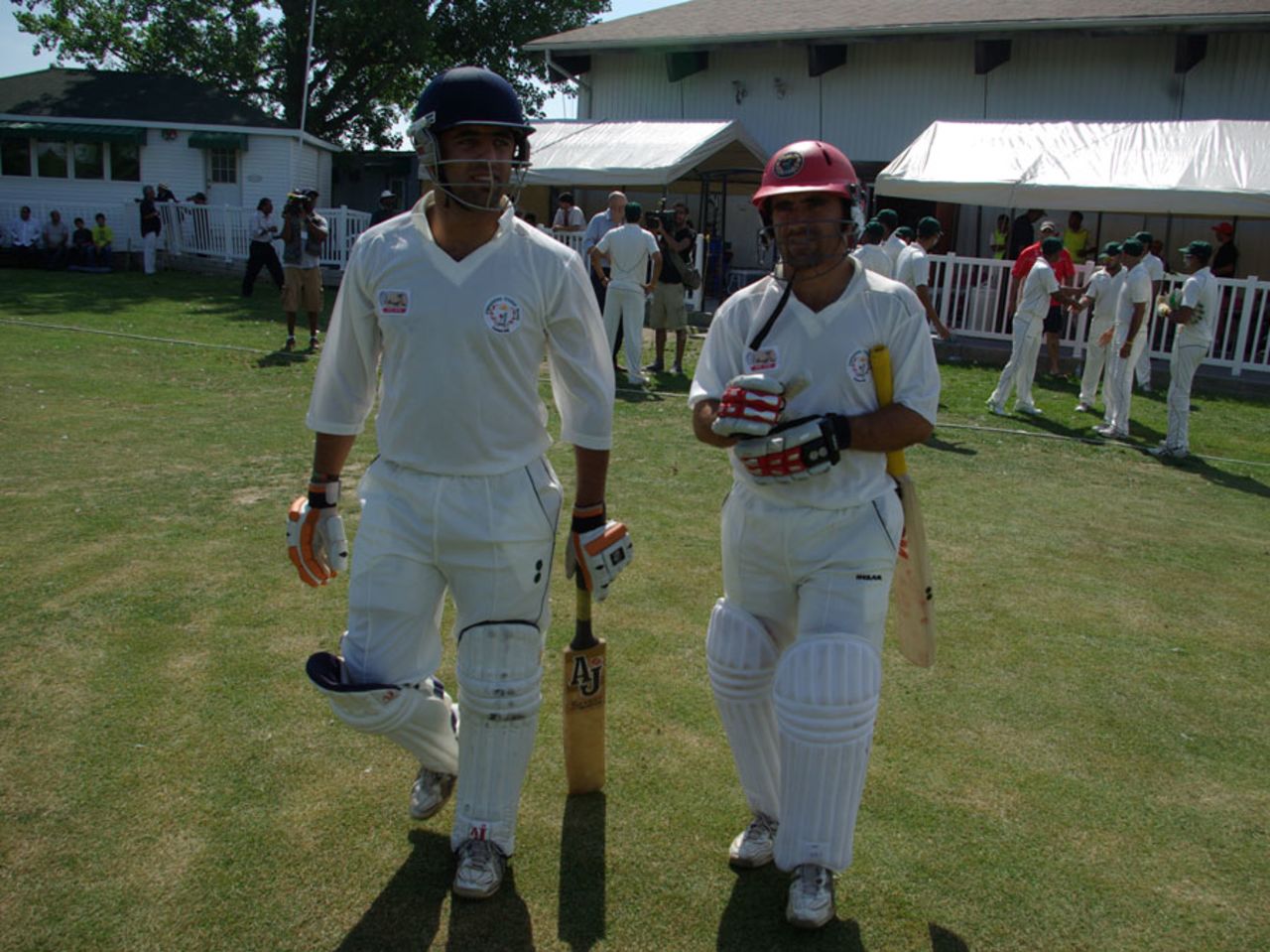 Afghanistan openers Noor Ali Zadran and Karim Sadiq head out to bat in the first innings, Canada v Afghanistan, ICC Intercontinental Cup, day 1, King City, August 2, 2011