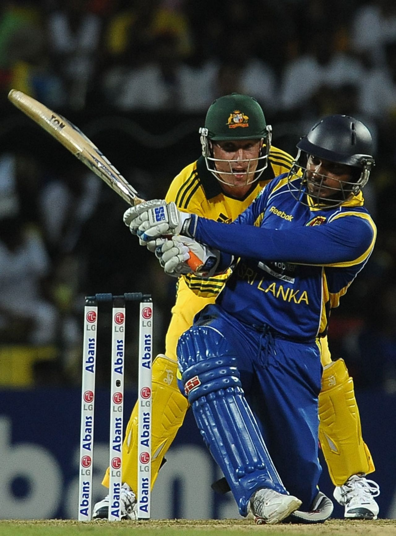 Kumar Sangakkara slog sweeps during his cameo, Sri Lanka v Australia, 1st Twenty20, Pallekele, August 6, 2011