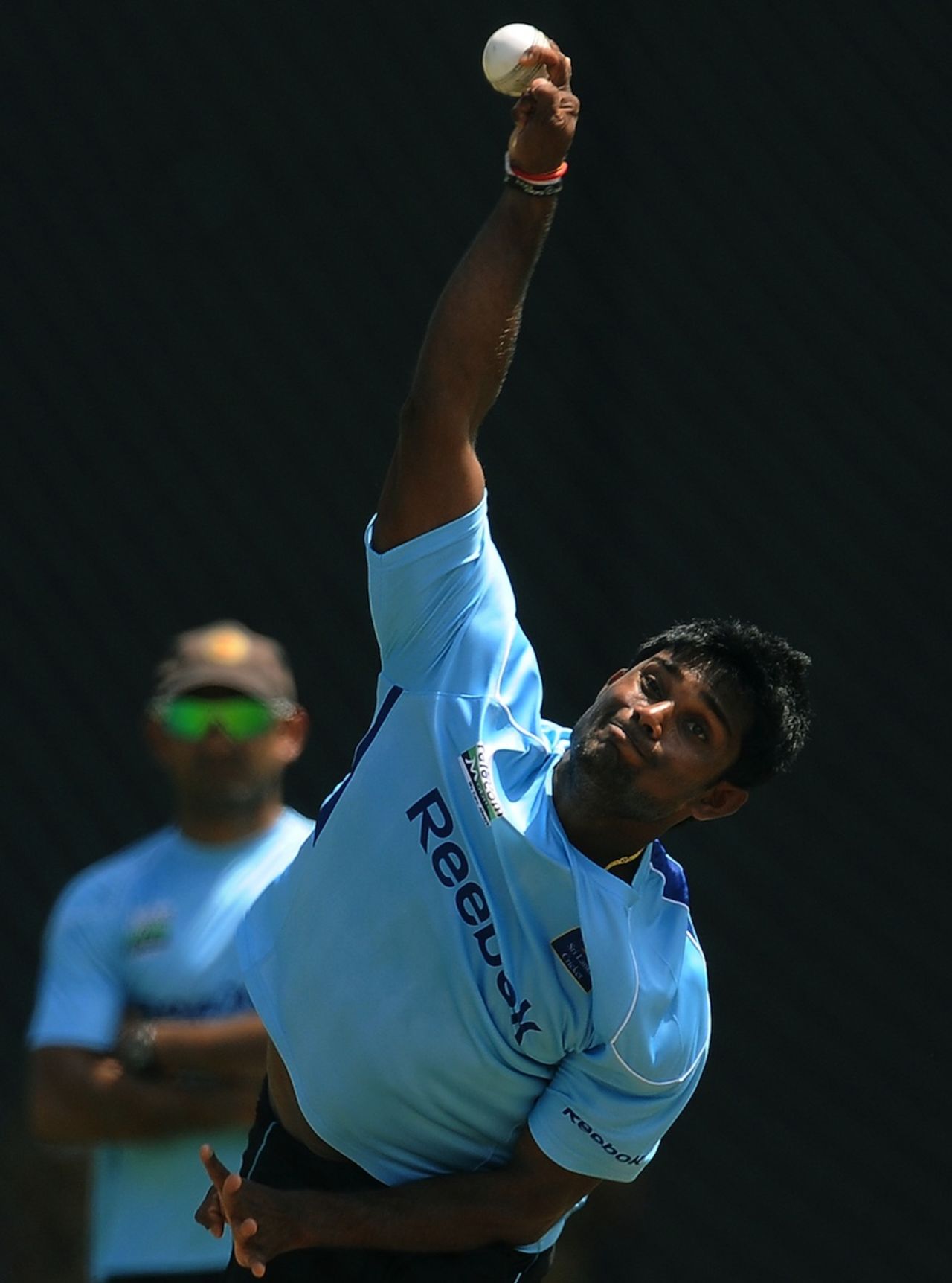 Seekkuge Prasanna practices ahead of the fourth ODI, Premadasa Stadium, Colombo, August 19, 2011