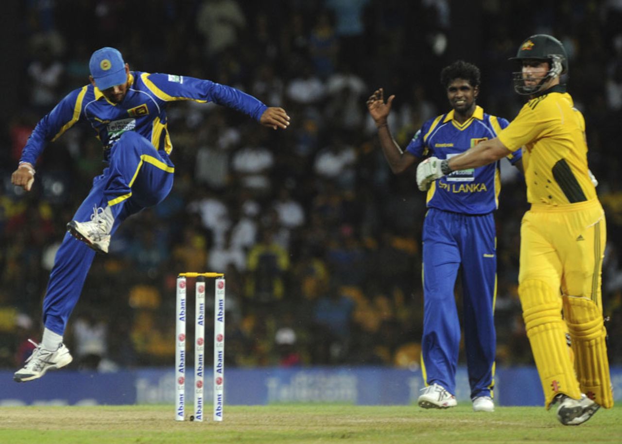 Tillakaratne Dilshan jumps as he tries to evade a throw, Sri Lanka v Australia, 4th ODI, R Premadasa Stadium, Colombo, August 20, 2011