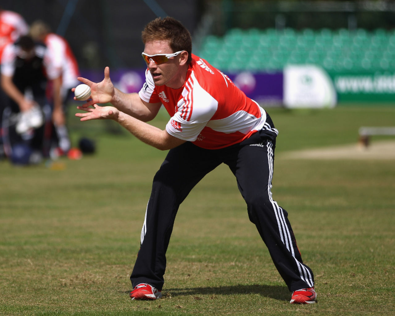 Eoin Morgan sets himself to take a catch during England's practice session, Dublin, Auguest 24 2011