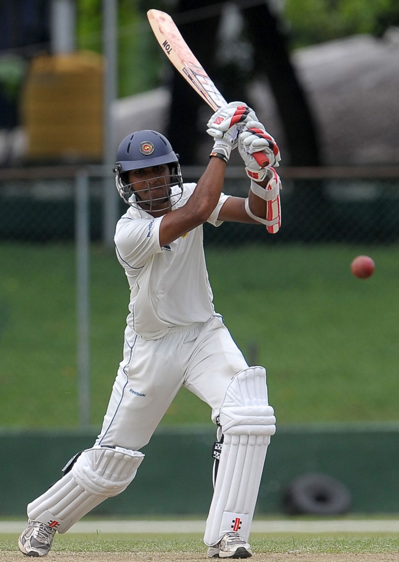 Dinesh Chandimal plays a drive, Sri Lanka Board XI v Australians, Colombo, 1st day, August 25, 2011 