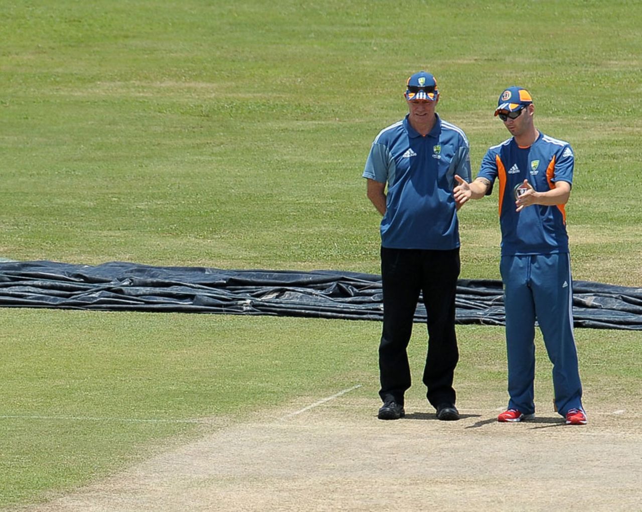 Greg Chappell and Michael Clarke take a close look at the pitch, Galle, August 29, 2011