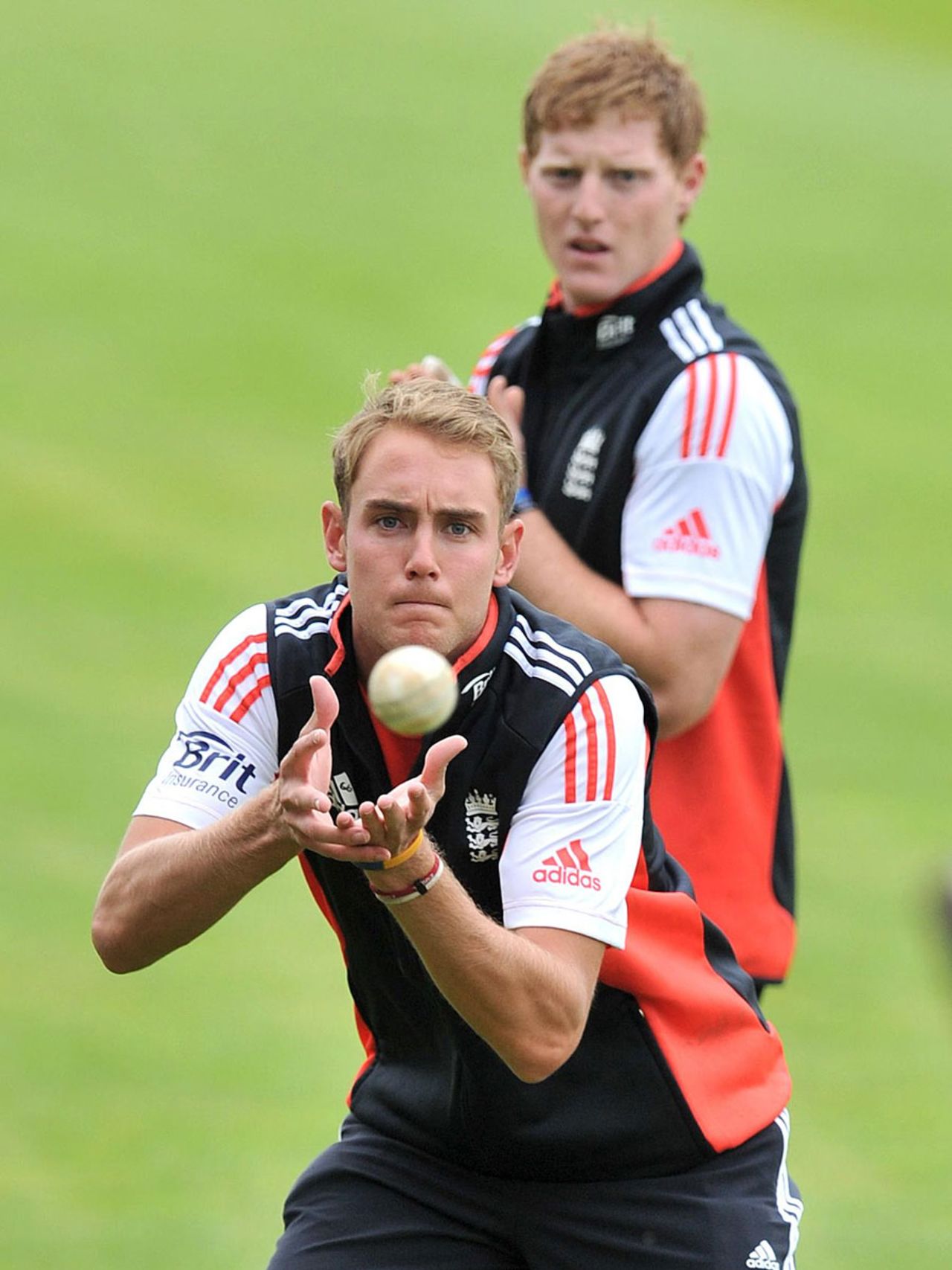 Stuart Broad goes through fielding drills with Ben Stokes in the background, Old Trafford, August 30, 2011