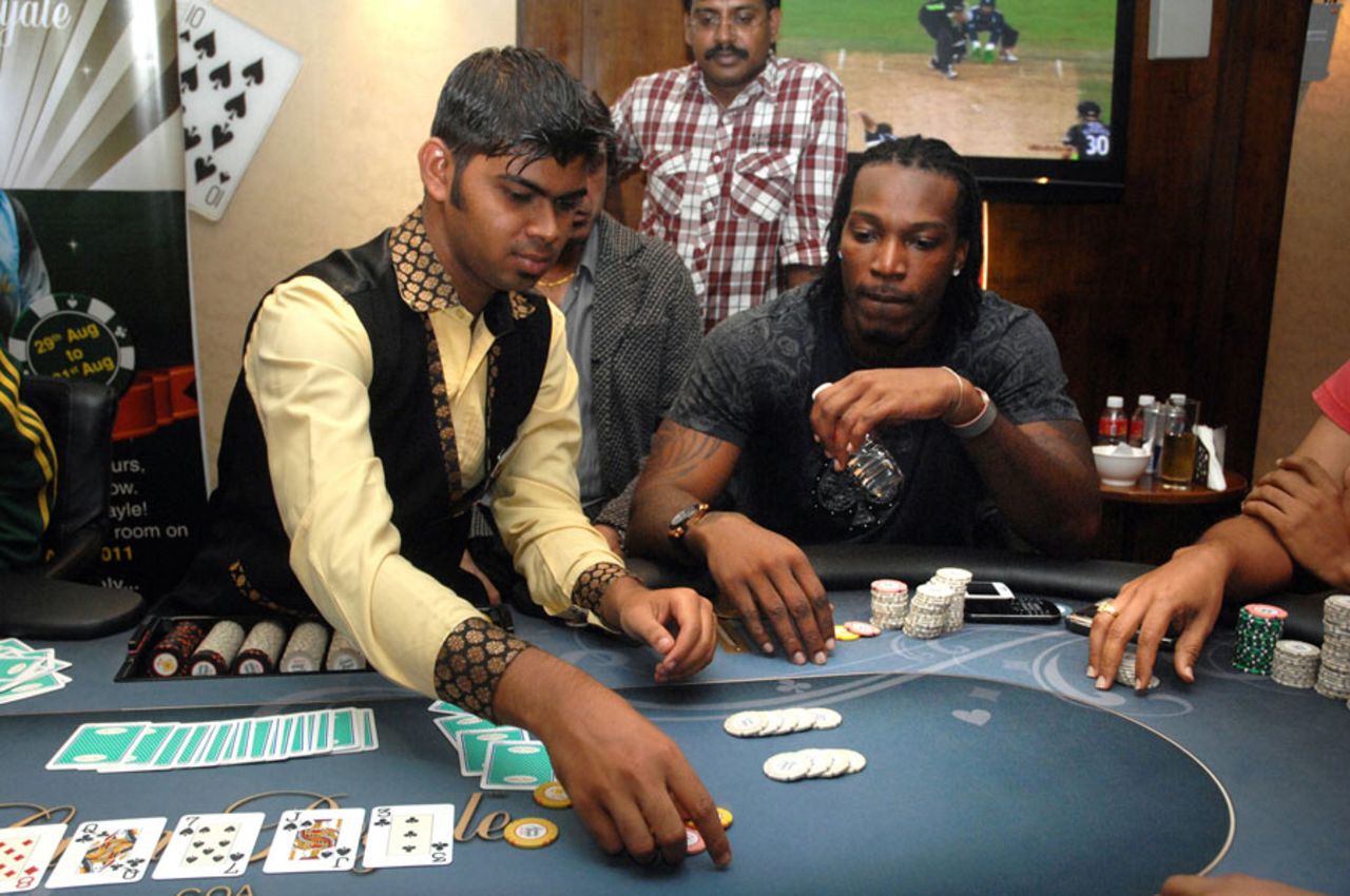 Chris Gayle plays poker at a casino in Goa, August 30, 2011