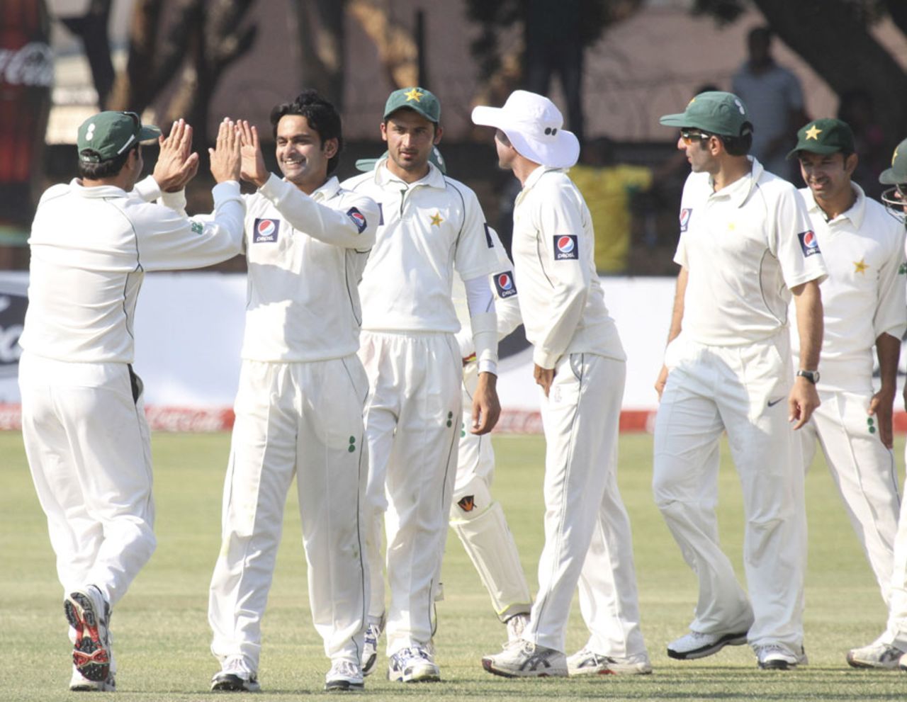 Pakistan get together after a wicket, Zimbabwe v Pakistan, only Test, 4th day, Bulawayo, September 4, 2011