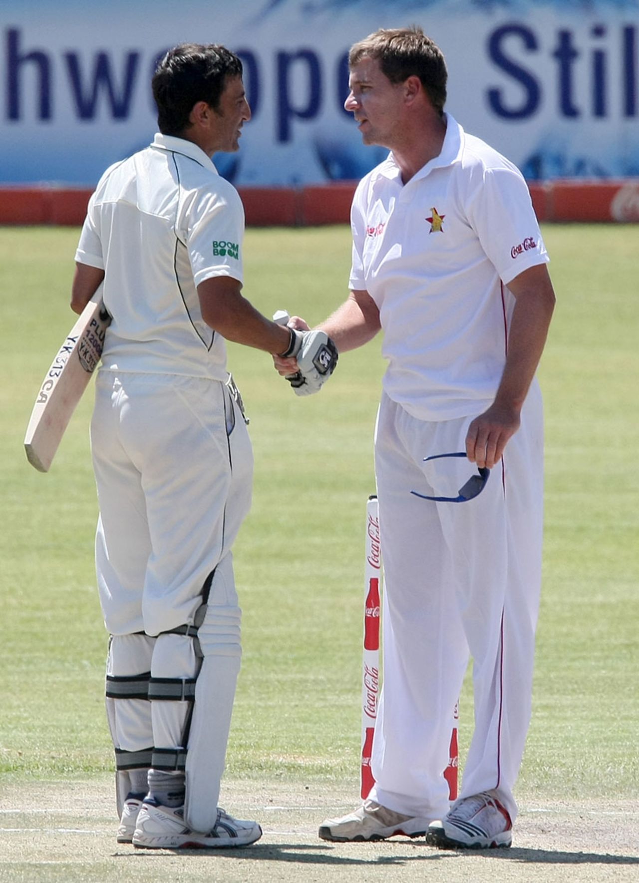 Ray Price congratulates Younis Khan after Pakistan's victory, Zimbabwe v Pakistan, only Test, 5th day, Bulawayo, September 5, 2011