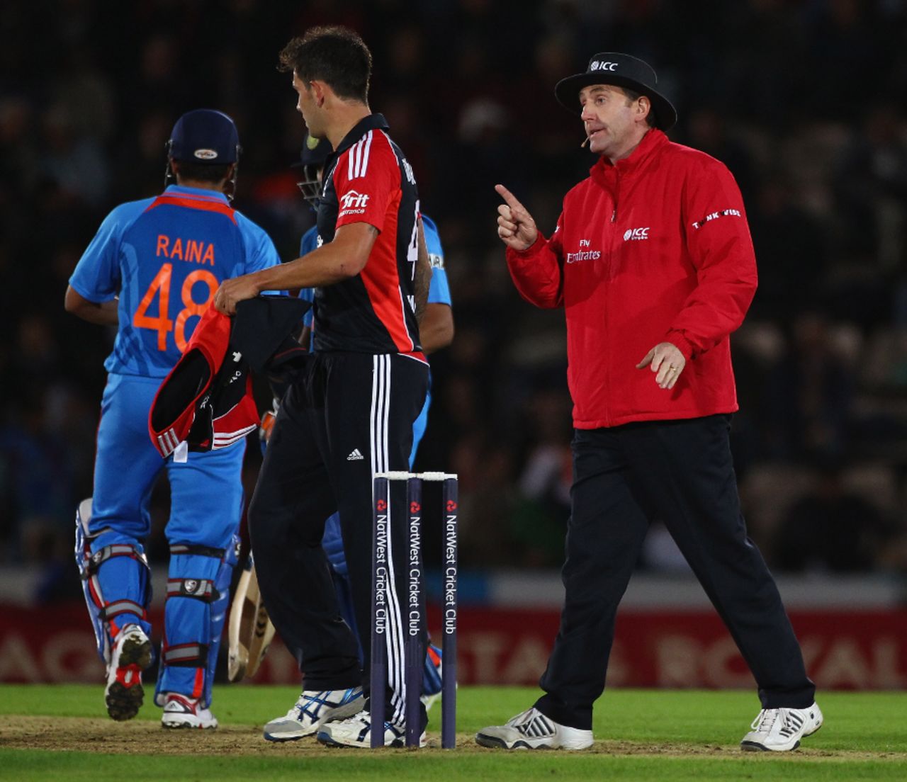 Jade Dernbach is reprimanded by umpire Rob Bailey after a spat with Suresh Raina, England v India, 2nd ODI, Rose Bowl, September 6 2011
