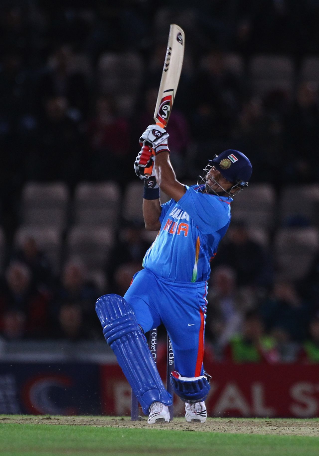 Suresh Raina launches one into the leg side during his 19-ball 40, England v India, 2nd ODI, Rose Bowl, September 6 2011