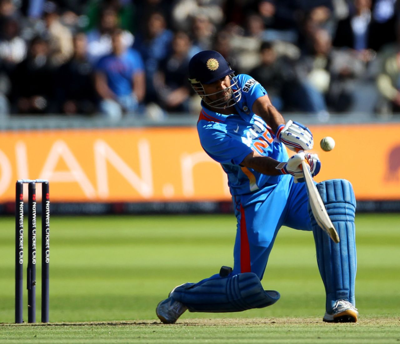 MS Dhoni launches a six at the end of India's innings, England v India, 4th ODI, Lord's, September 11, 2011