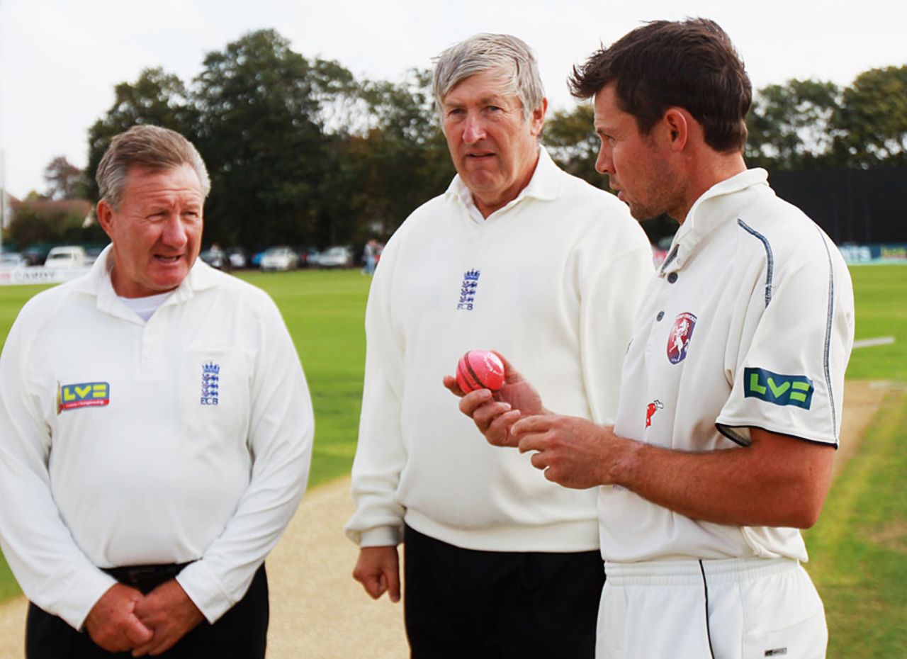 Geraint Jones inspects the pink ball with umpires Martin Bodenham (right) and Nigel Cowley (left), Kent v Glamorgan, County Championship, Division Two, Canterbury, September 12, 2011