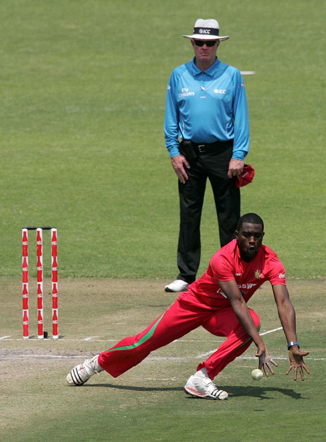 Elton Chigumbura takes a low catch to remove Shoaib Malik, Zimbabwe v Pakistan, 3rd ODI, Harare, September 14, 2011