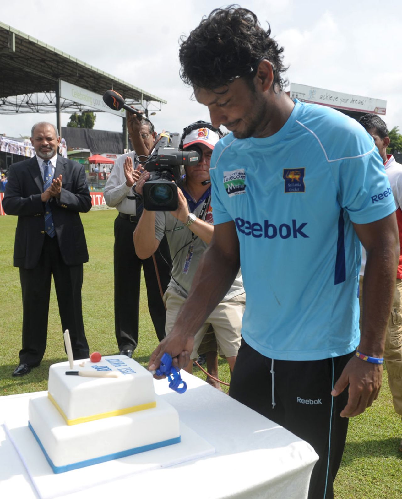 Kumar Sangakkara celebrates the occasion of his 100th Test with a cake, Sri Lanka v Australia, 3rd Test, SSC, Colombo, 1st day, September 16, 2011