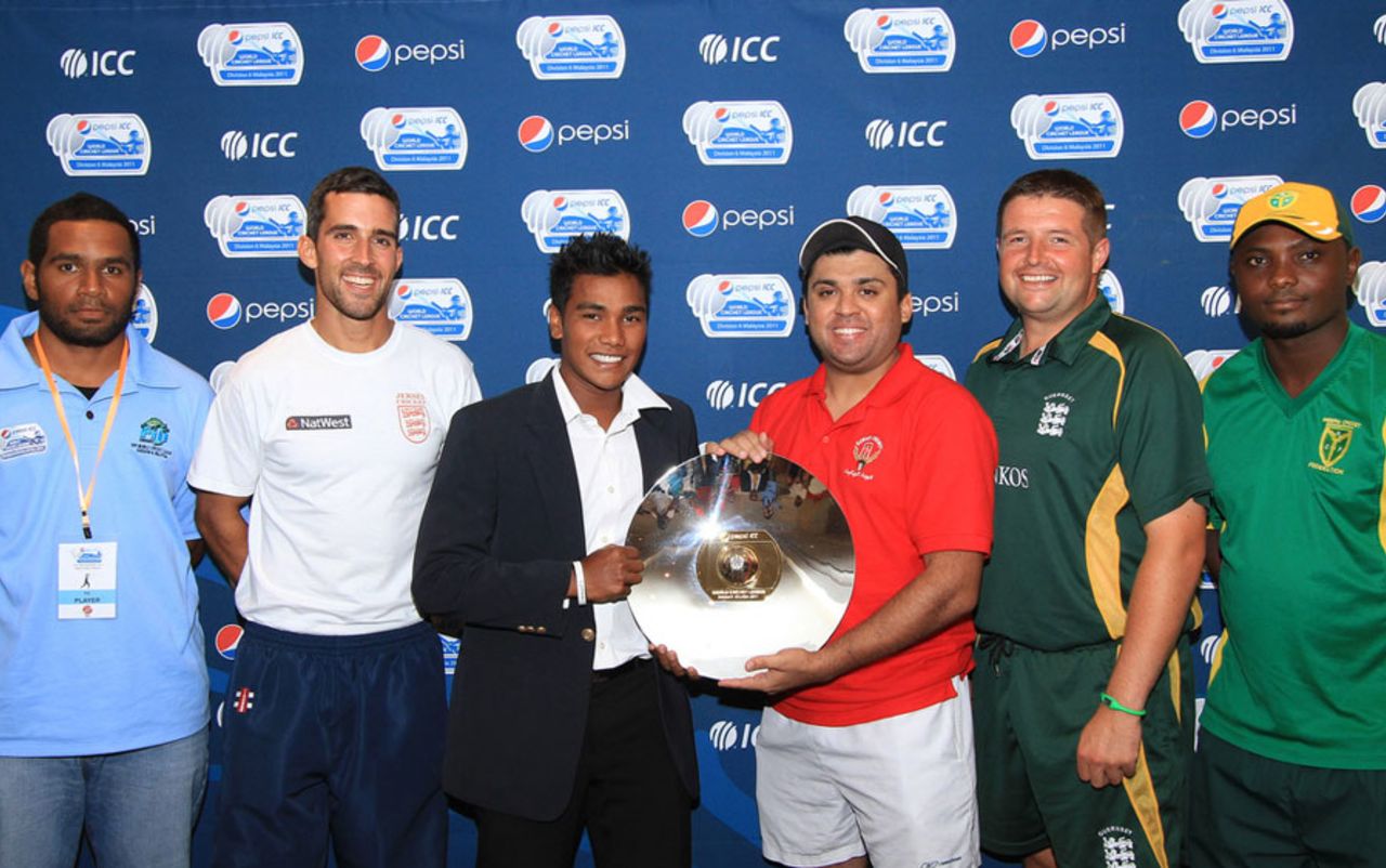 Captains of the participating teams with the ICC World Cricket League Division Six Trophy, Kuala Lumpur, September 16, 2011