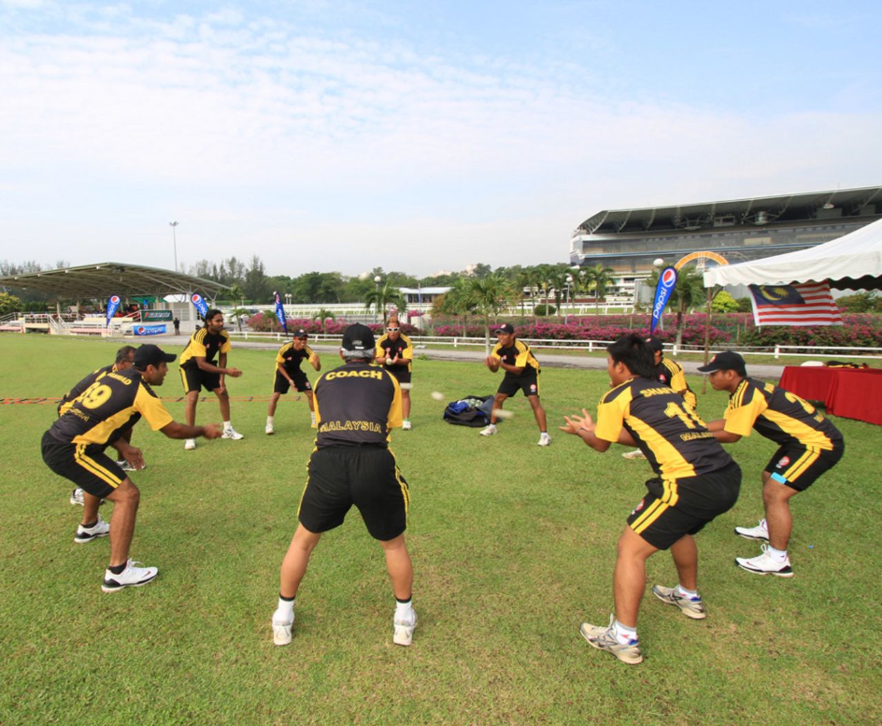 Malaysia's cricketers warm up before their match against Kuwait, Malaysia v Kuwait, World Cricket League Division Six, Kuala Lumpur, September 17 2011