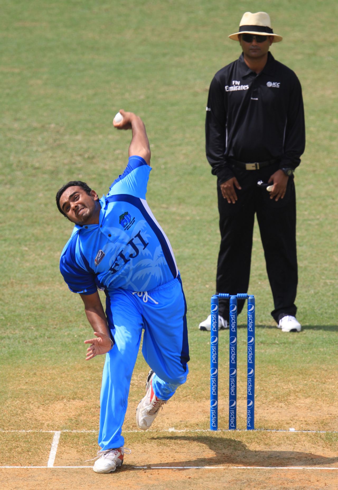 Mohammad Khan in full flow, Fiji v Guernsey, World Cricket League Division Six, Kuala Lumpur, September 18 2011