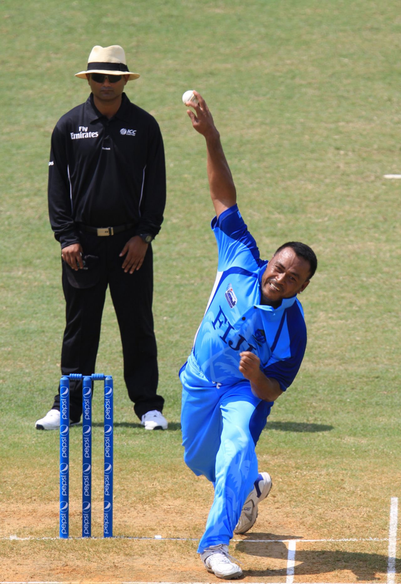 Waisake Tukana gives the ball a good rip, Fiji v Guernsey, World Cricket League Division Six, Kuala Lumpur, September 18 2011