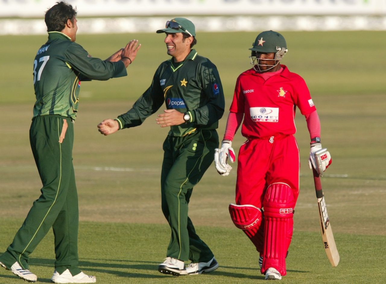 Misbah-ul-Haq and Sohail Khan celebrate the victory, Zimbabwe v Pakistan, 2nd Twenty20, Harare, September 18, 2011