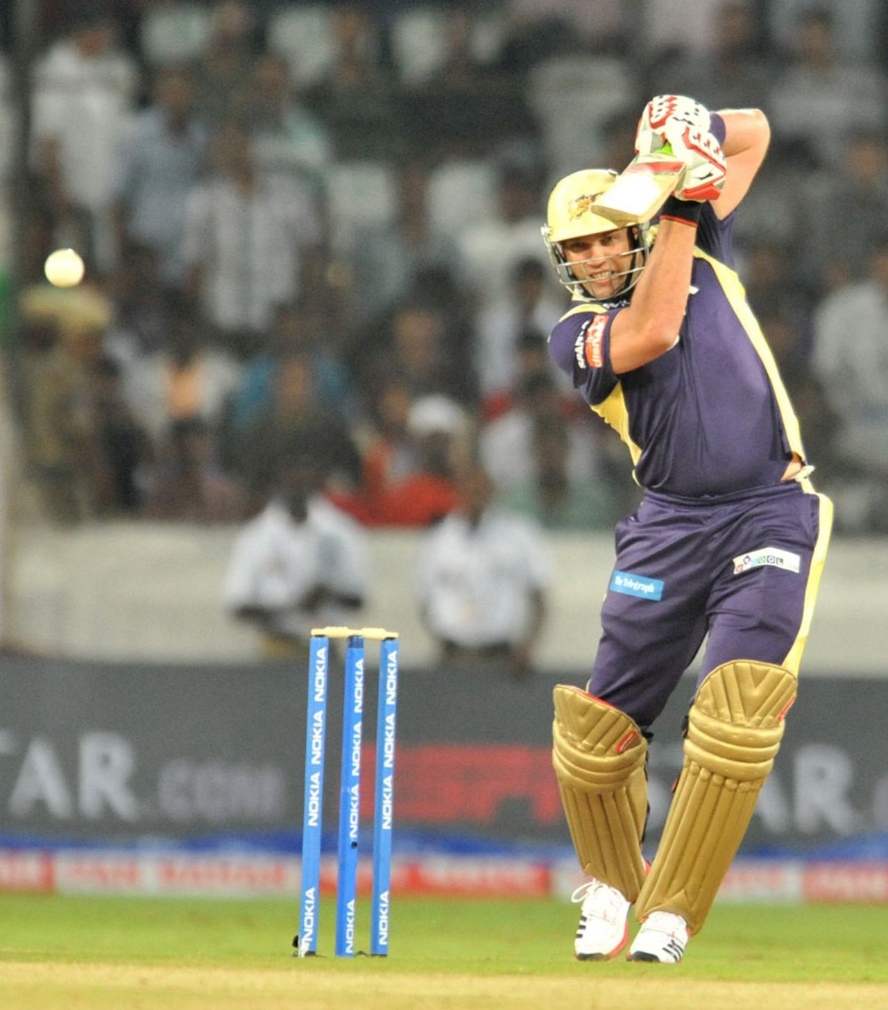 Jacques Kallis punches the ball down the ground, Auckland v Kolkata Knight Riders, CLT20 qualifier, Hyderabad, September 19, 2011