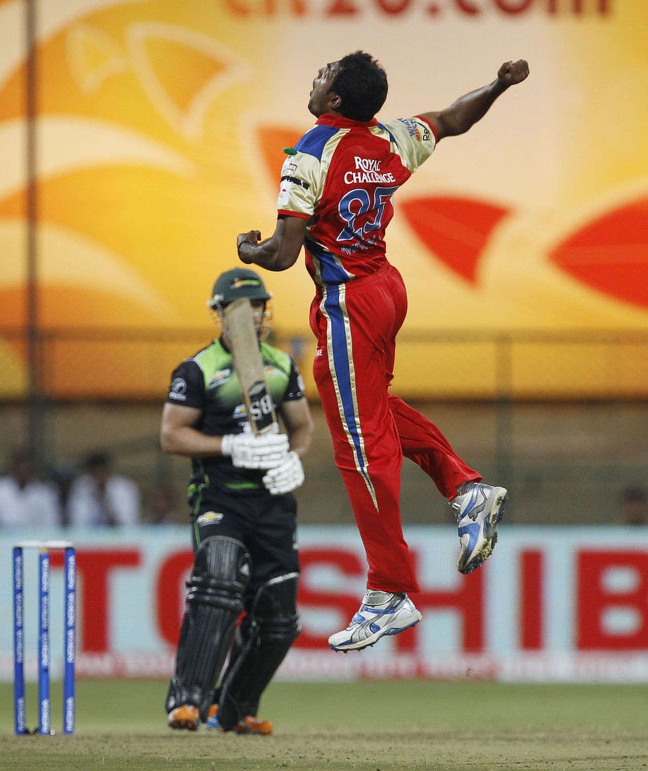 Abhimanyu Mithun leaps after getting rid of Craig Thyssen, Royal Challengers Bangalore v Warriors, CLT20, Bangalore, September 23, 2011