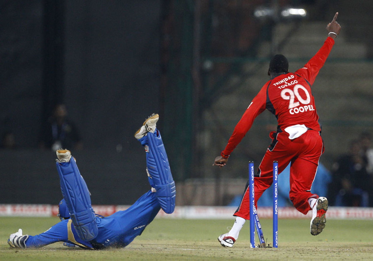 Kevon Cooper is ecstatic after Harbhajan Singh is run-out, Mumbai Indians v Trinidad & Tobago, Champions League T20, Bangalore, September 26, 2011