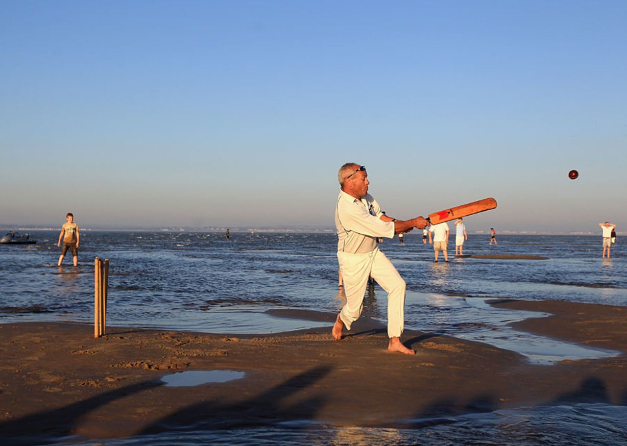 Damp wicket? The annual cricket match is played on the Brambles Sandbank in the Solent, Southampton, September 28, 2011